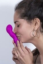 Tiffany masturbates with her pink dildo 